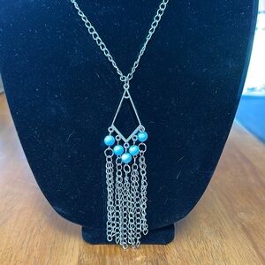 Silvertone necklace with double clasp and chandelier pendant.
